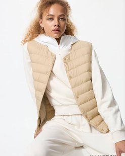 Жилетка Uniqlo бежева PUFFTECH Compact Vest 8155 фото