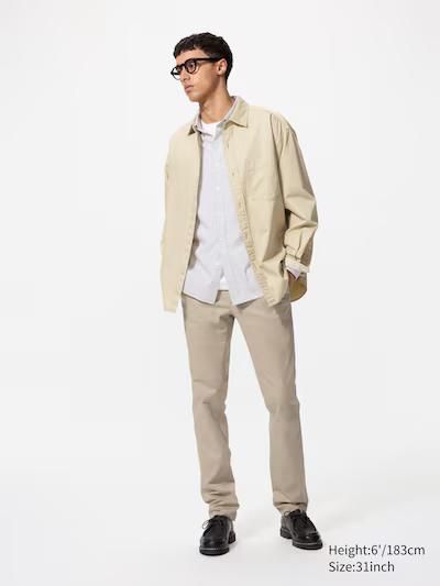Брюки чiнос Uniqlo блакитнi Slim Chino Pants 7412111 фото