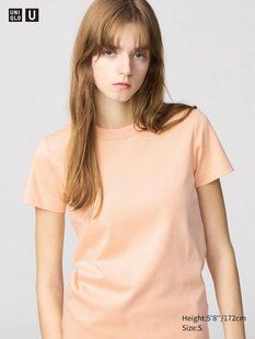 Футболка Uniqlo із серії U світло-помаранчева 7577111 фото