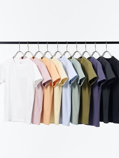 Футболка Uniqlo із серії U світло-помаранчева 7577111 фото